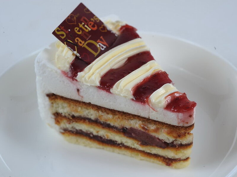 slice of cake with chocolate decoration