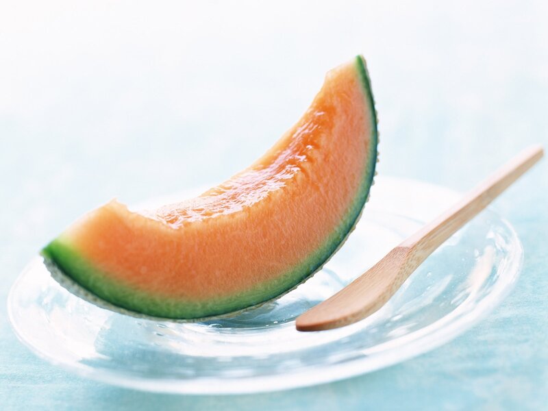 slice of cantaloupe on plate