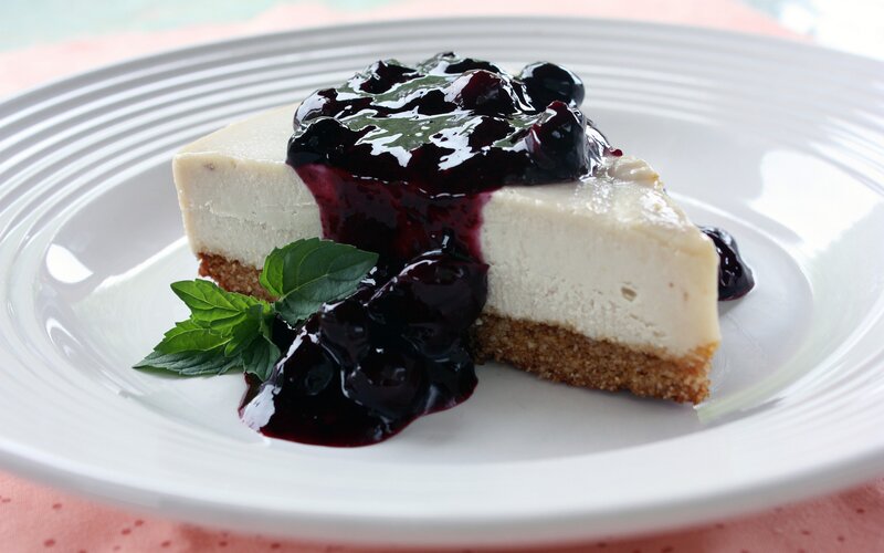 Slice of Cheesecake — White, Appetizing, Photograph, Blueberry Sauce, Mint Leaf, Crust