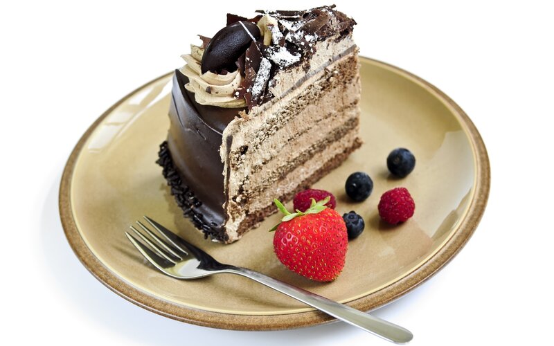 slice of chocolate cake with berries