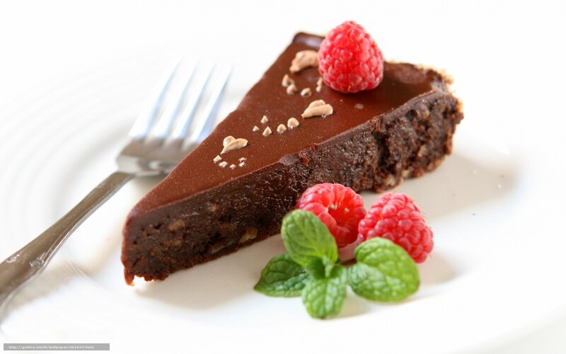 slice of chocolate cake with raspberries