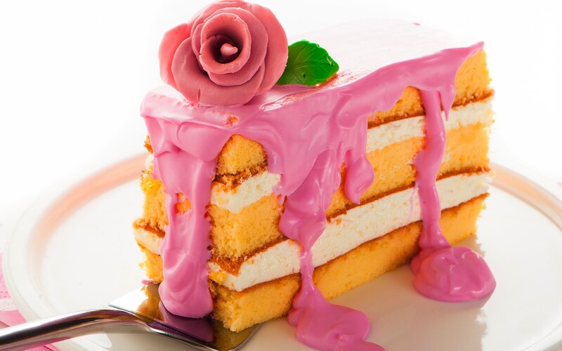 Slice of pink-frosted cake