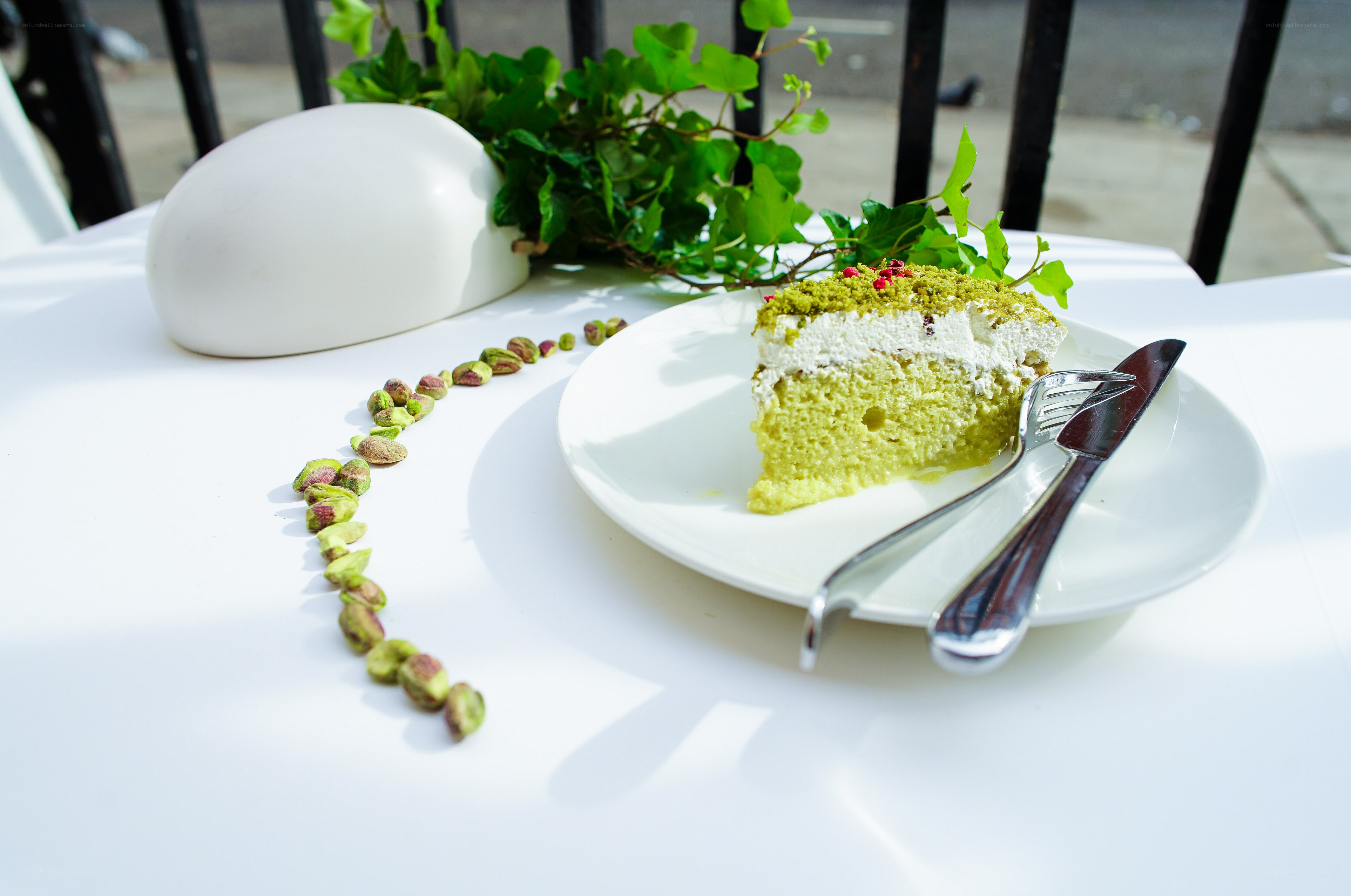 Slice of pistachio cake on a table