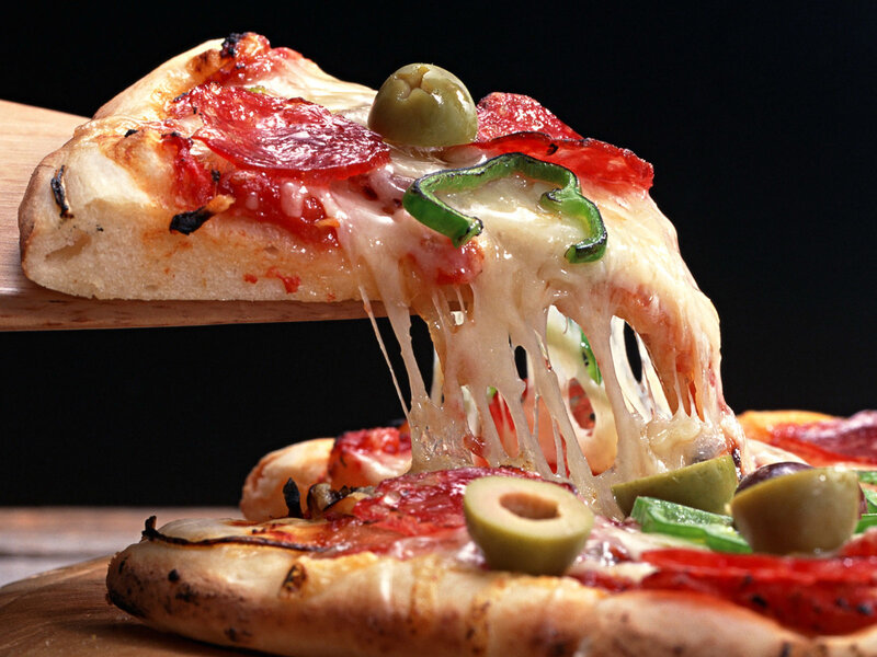 Slice of Pizza Being Lifted — Red