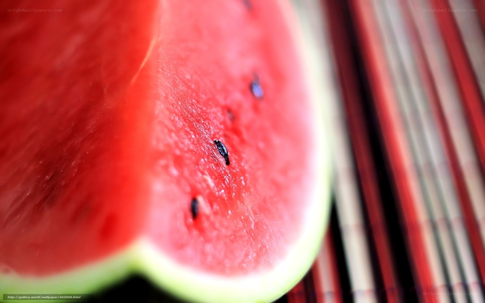 slice of watermelon on mat