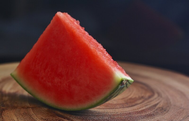 slice of watermelon on wood