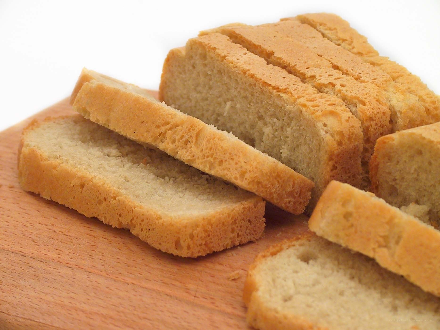 sliced bread on wooden board