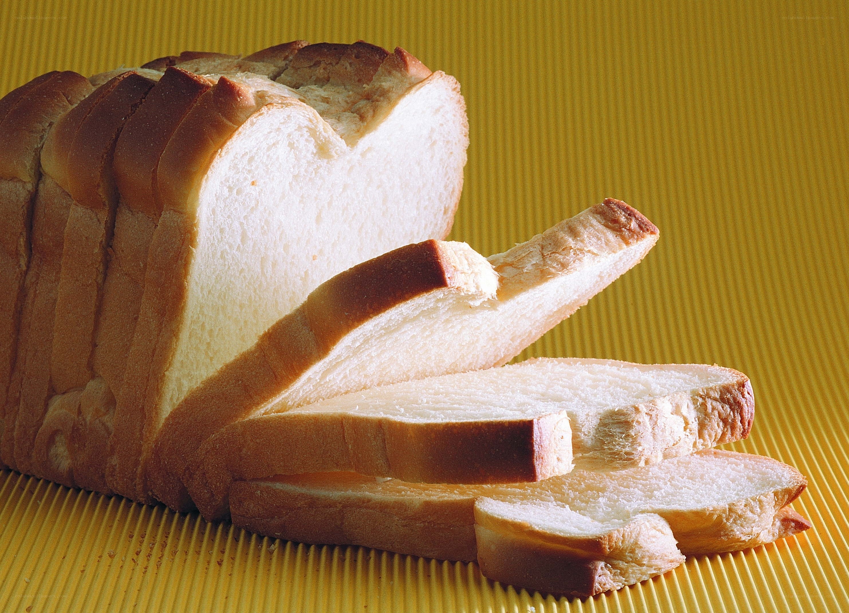 sliced bread on yellow surface