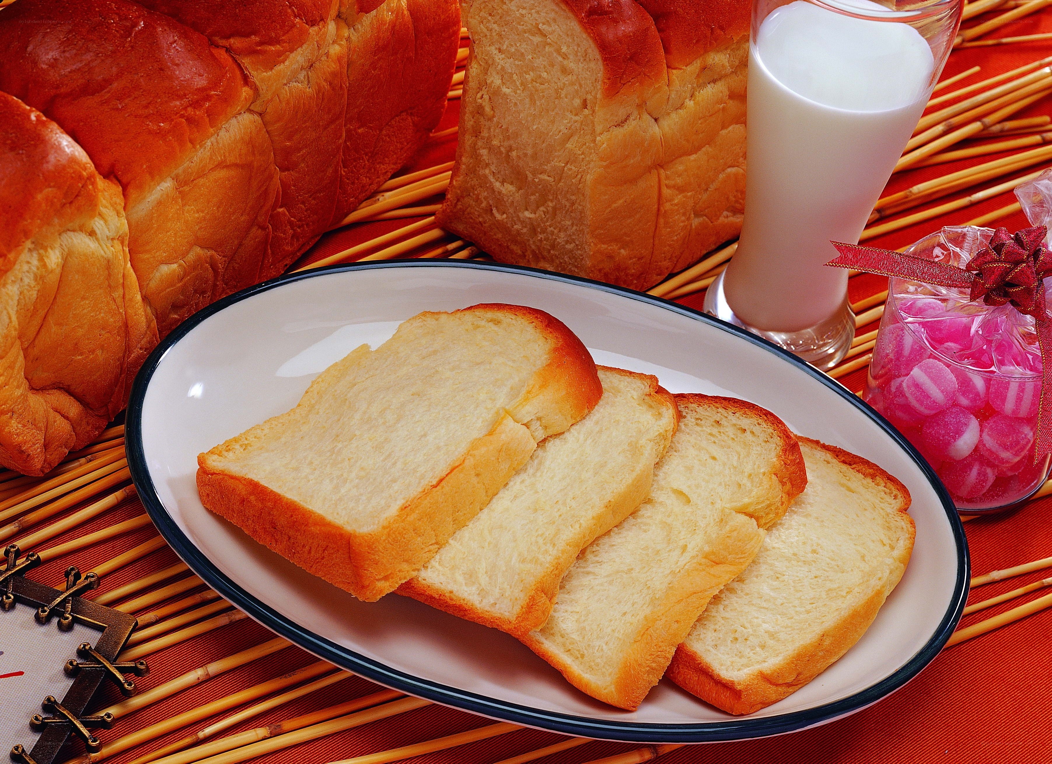 Sliced bread with milk and candy