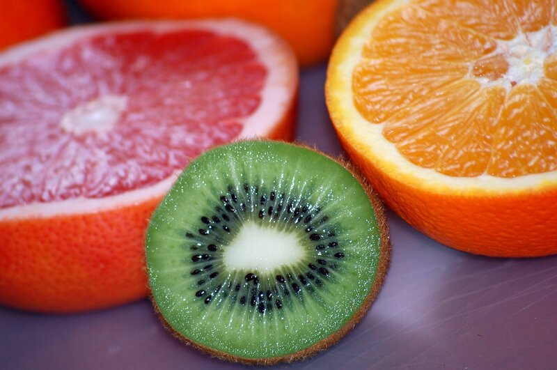 sliced citrus fruits and kiwi