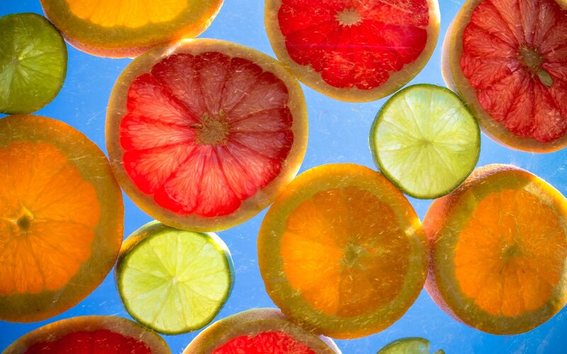 Sliced Citrus Fruits — Blue