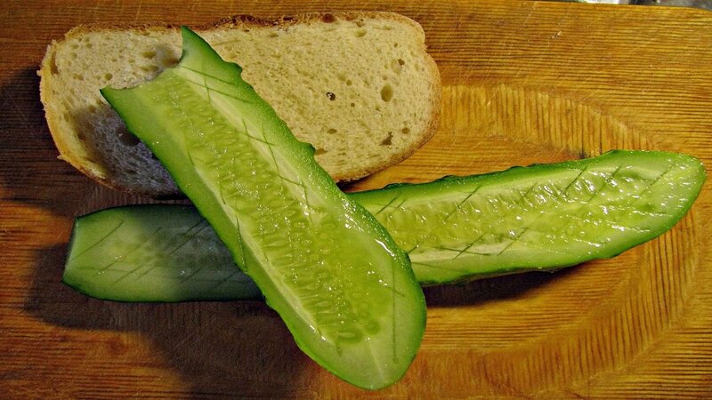 sliced cucumber on bread