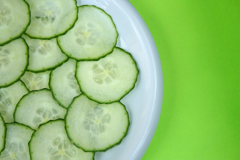 sliced cucumbers on a plate