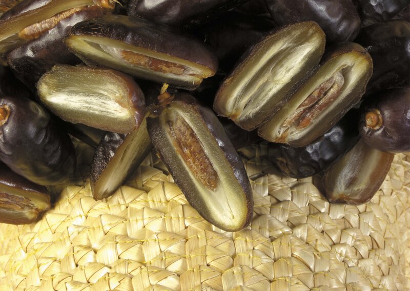 sliced dates on woven mat