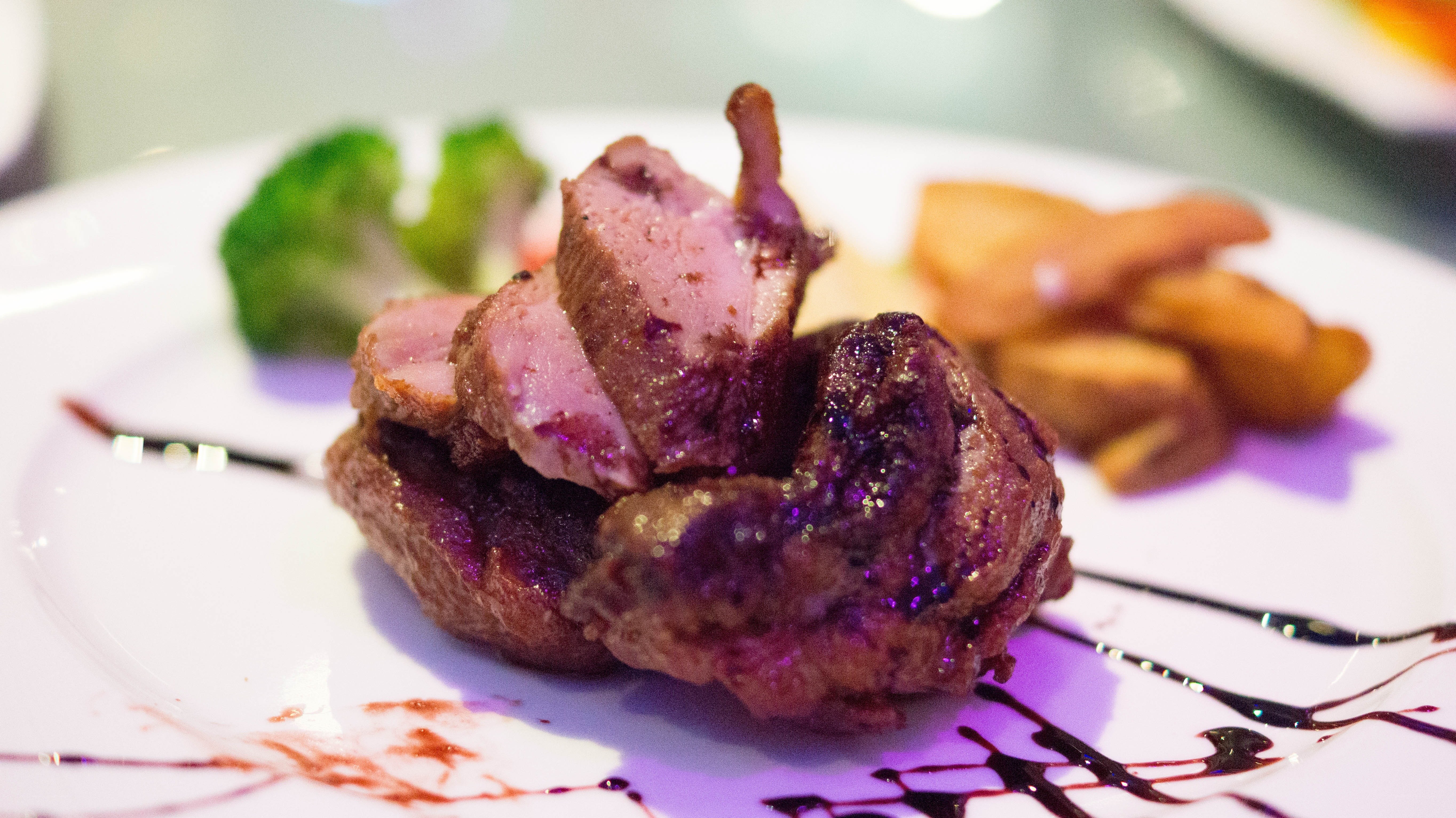 Sliced duck breast with sauce