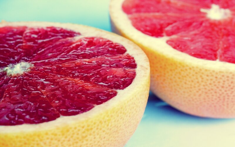 Sliced Grapefruit Halves — Red, Fresh