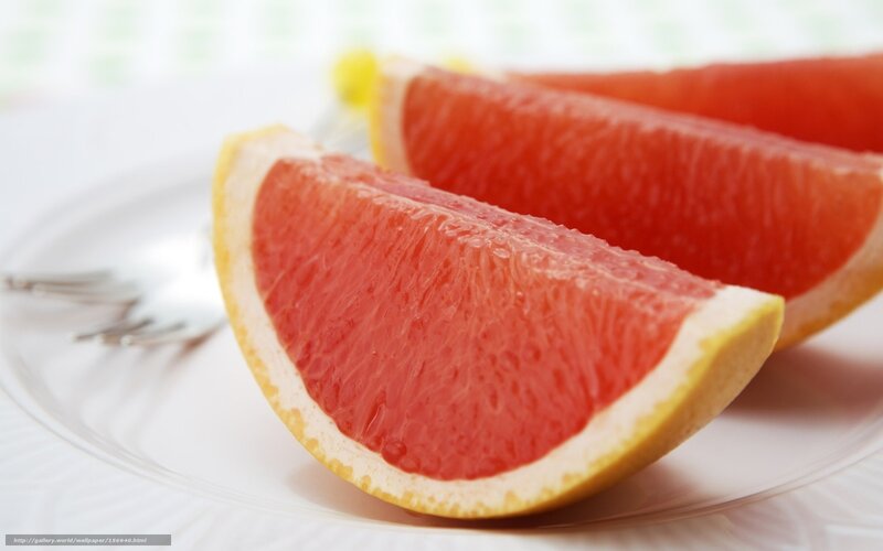 Sliced grapefruit on a plate