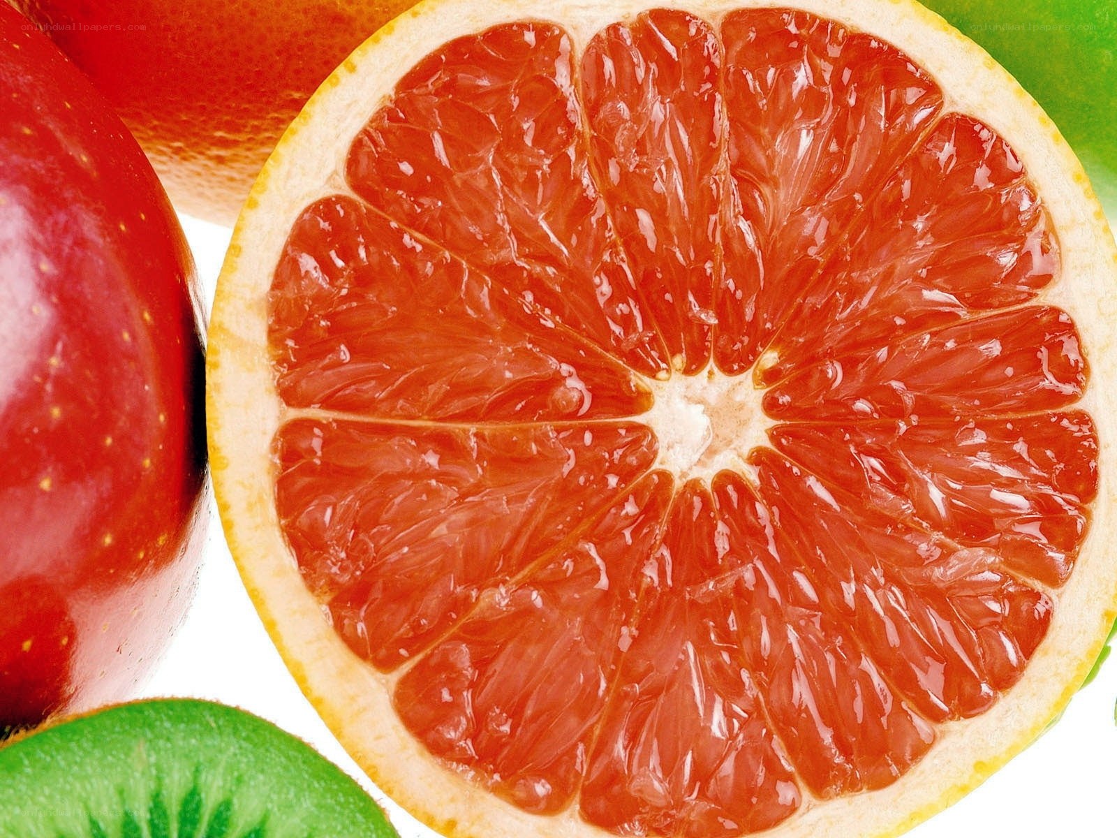 Sliced grapefruit with fruits