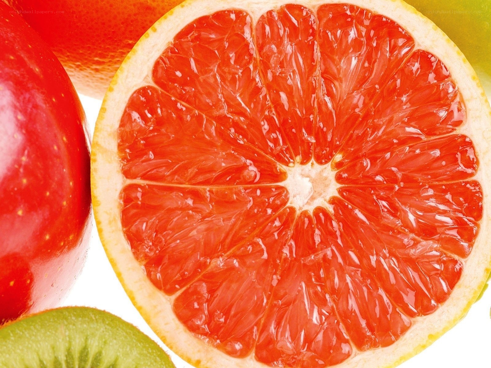 sliced grapefruit with fruits
