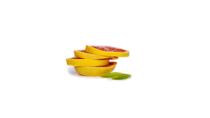 Sliced Grapefruit with Leaf