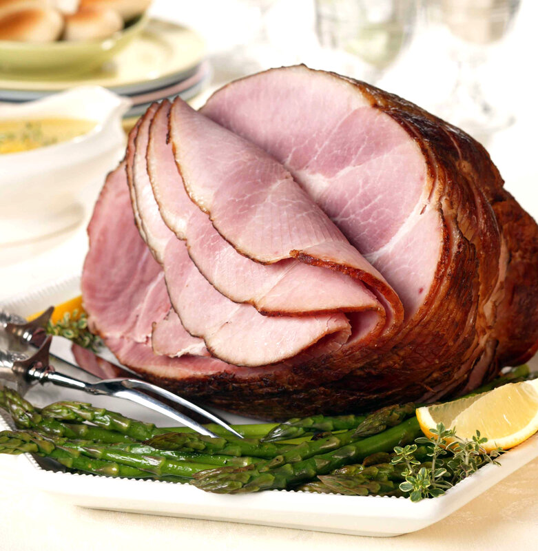 Sliced ham with asparagus