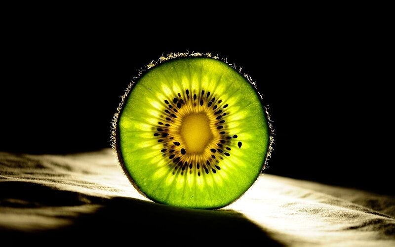 Sliced Kiwi Fruit — Green, Dramatic, Photograph, Table, Light