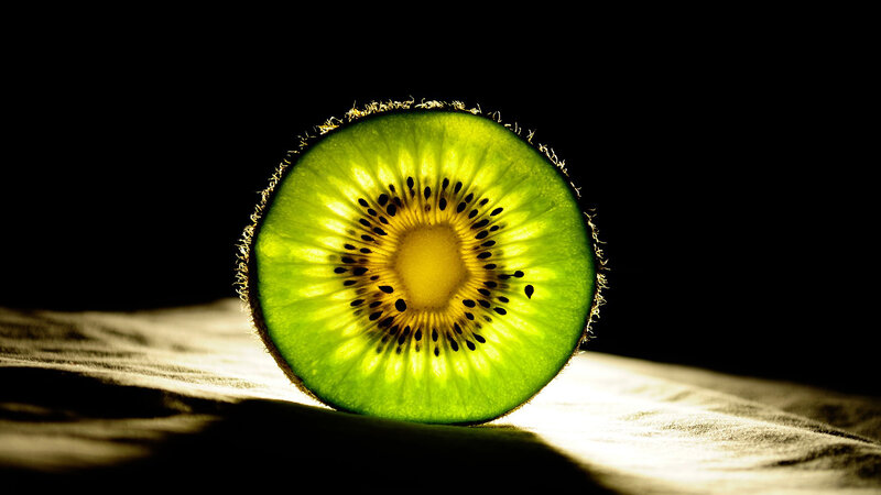 Sliced Kiwi Fruit — Green, Dramatic, Photograph