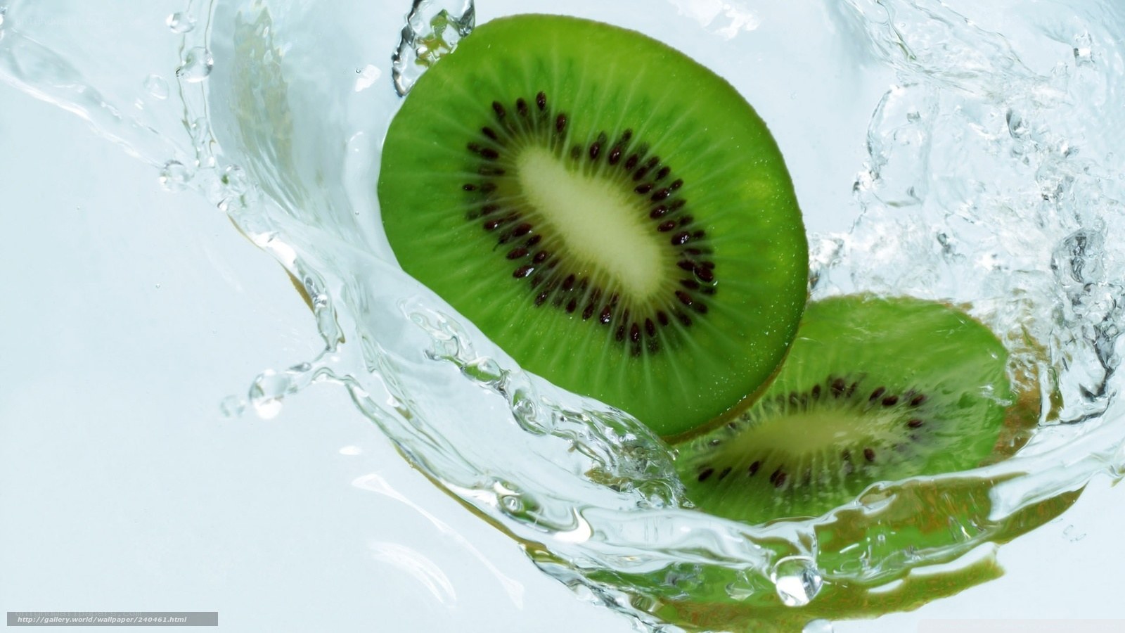 sliced kiwi in water splash