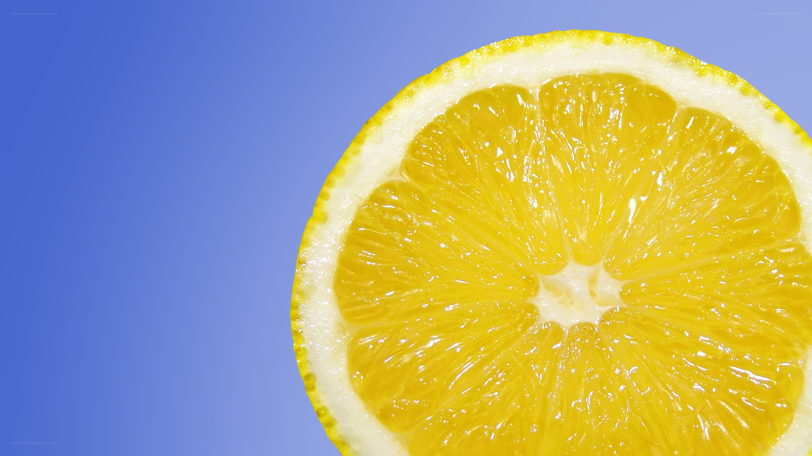 sliced lemon on blue
