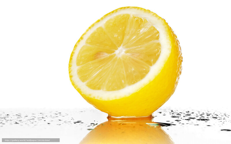 sliced lemon on wet surface
