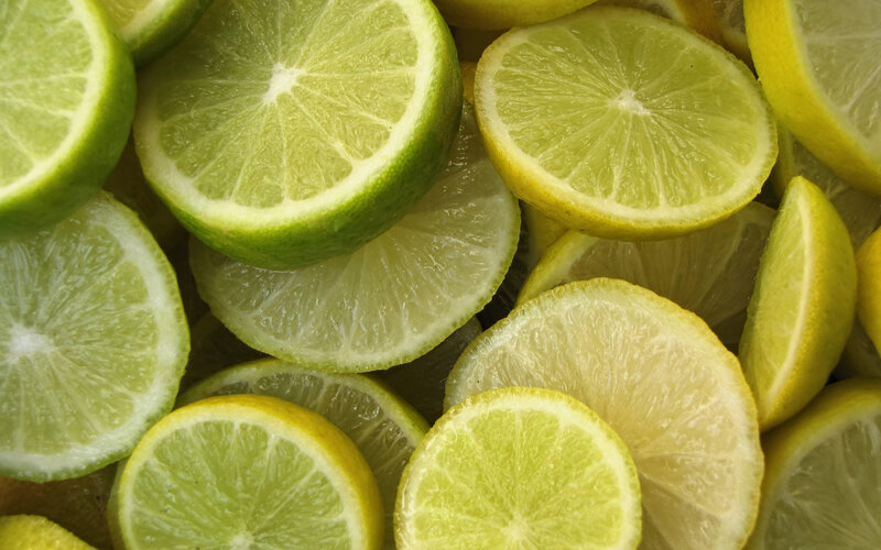 sliced lemons and limes