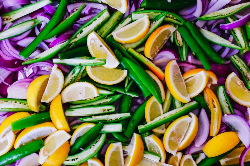 Sliced lemons and peppers