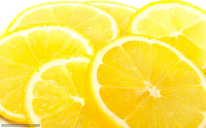 sliced lemons on white