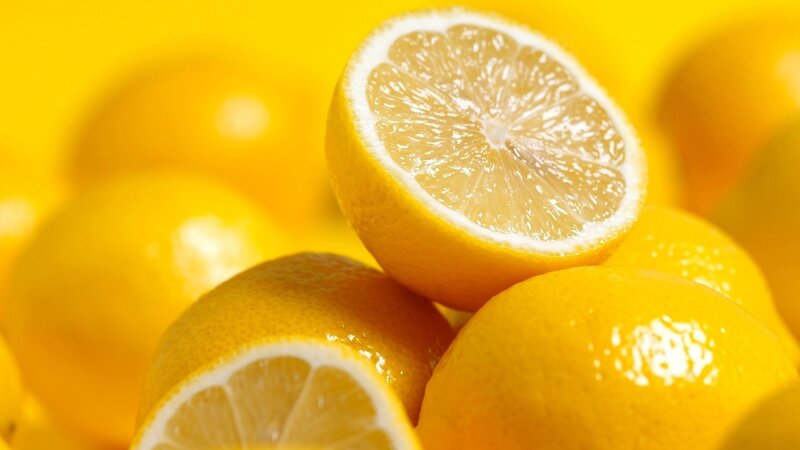 Sliced Lemons on Yellow