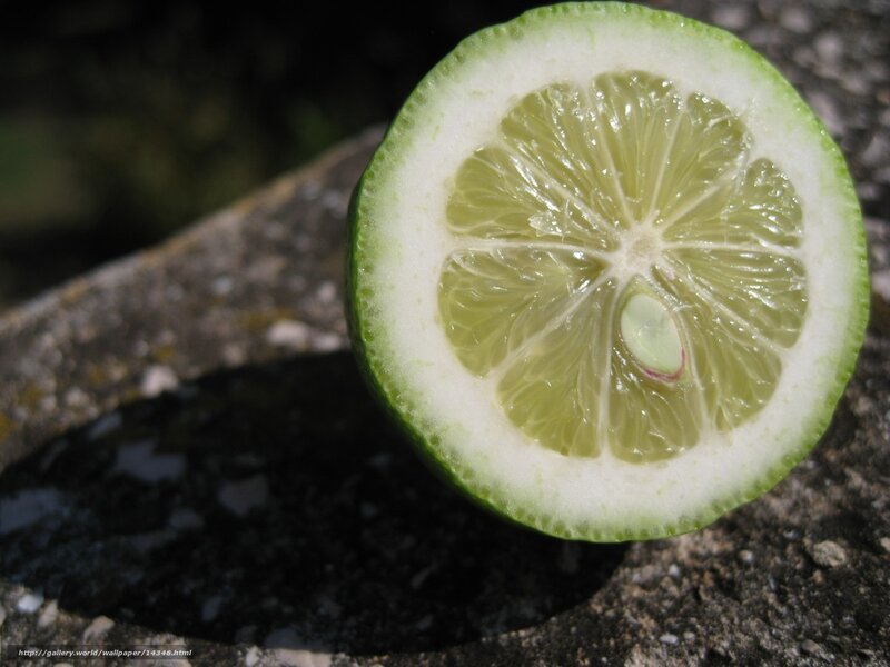 sliced lime on stone