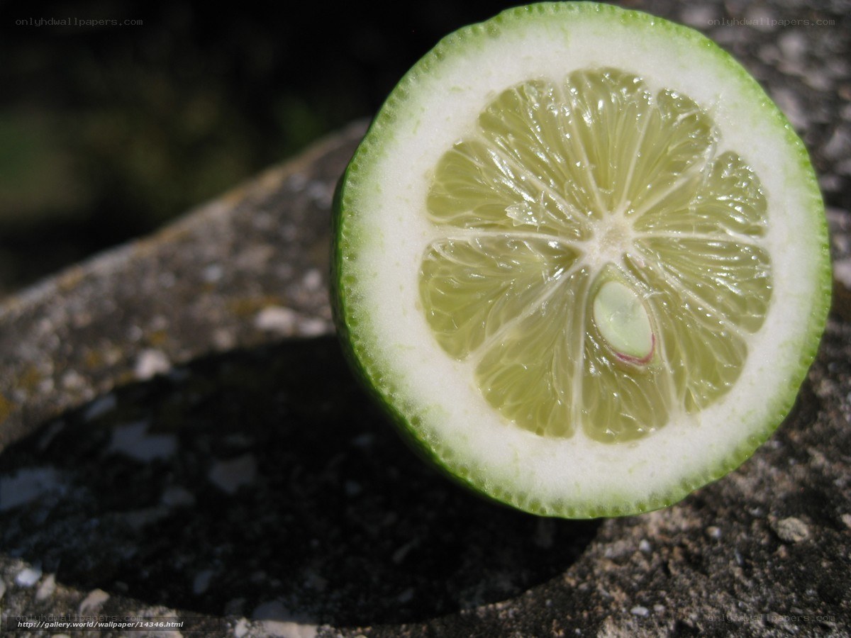 sliced lime on stone