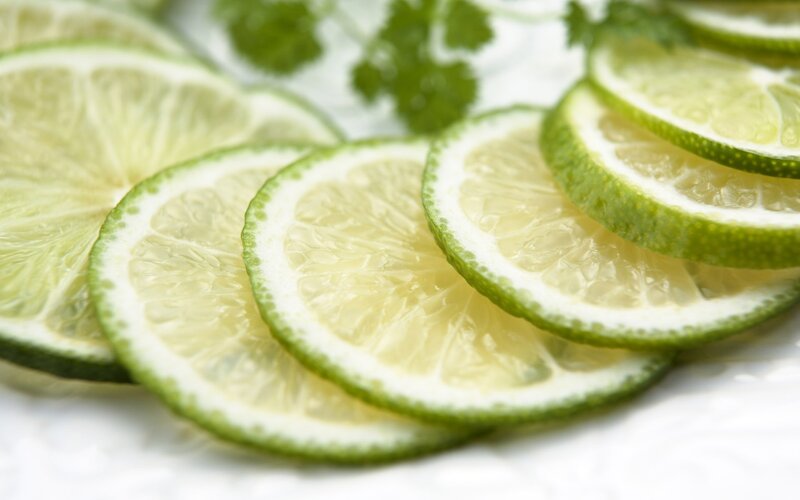 sliced lime wedges with cilantro