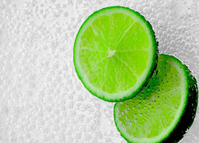 Sliced limes in carbonated water