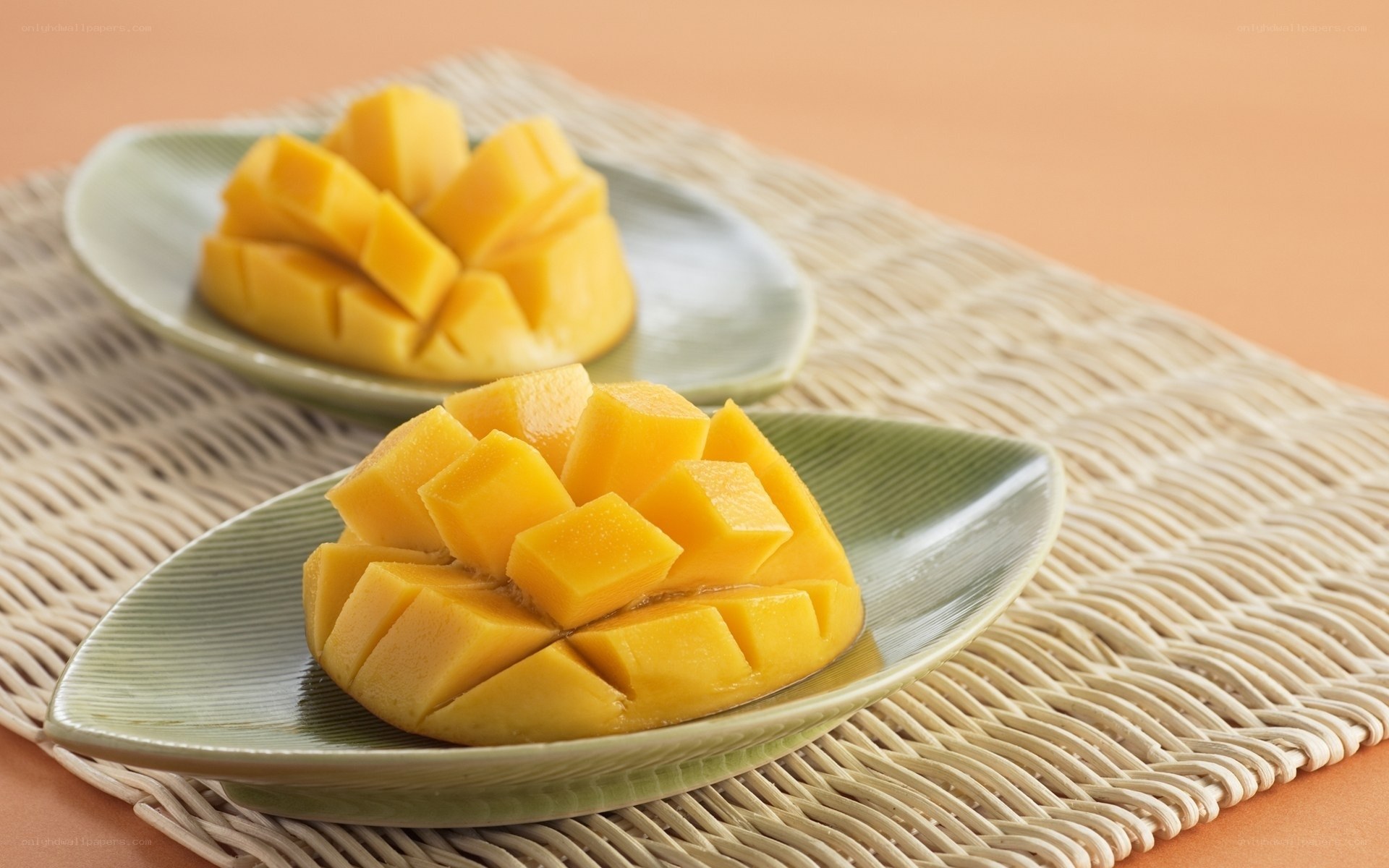 sliced mango on plates