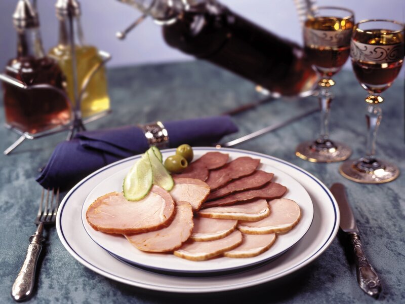 Sliced meats with olives and pickles