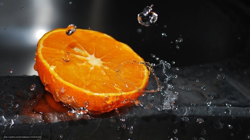Sliced Orange Fruit — Dramatic, Photograph, Water, Splashes, Black Surface