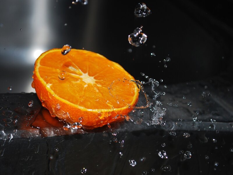 Sliced Orange Fruit — Dramatic, Photograph, Water, Splashes