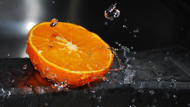 Sliced Orange Fruit — Dramatic, Photograph, Water