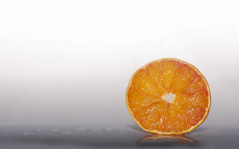 Sliced Orange Fruit — Minimalist, Photograph
