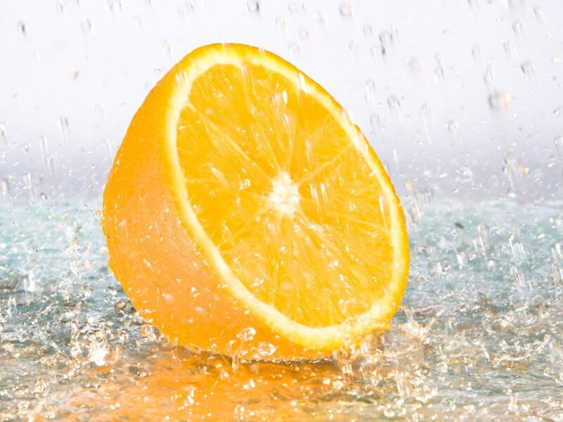 Sliced Orange Fruit — Vibrant, Photograph, Water