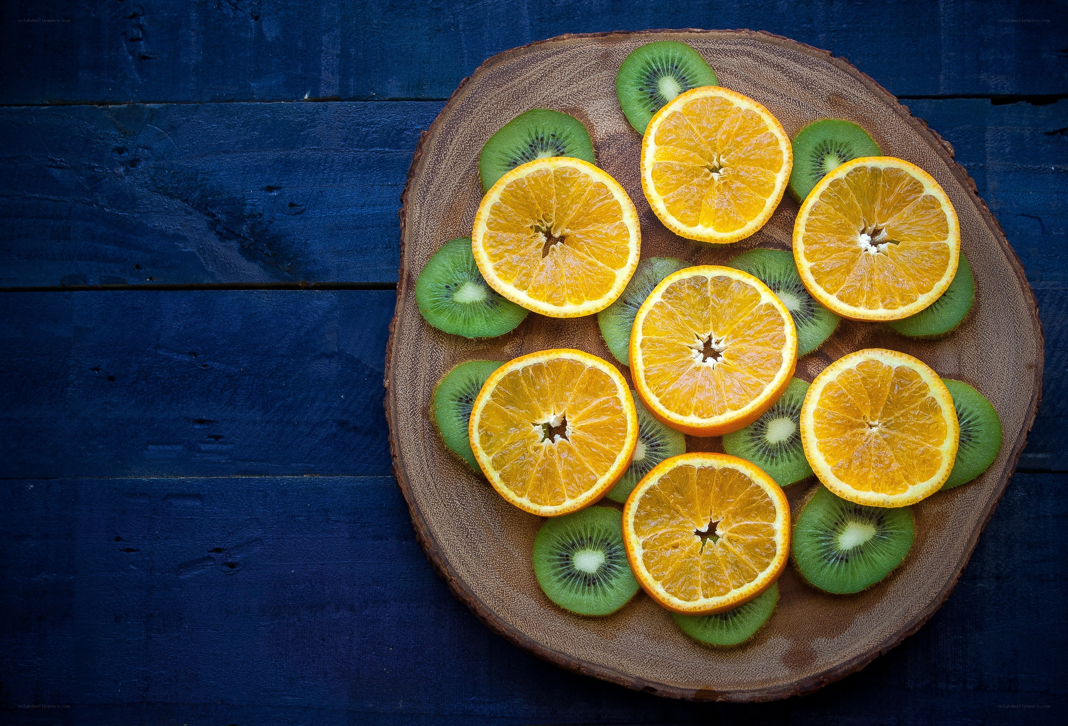 Sliced oranges and kiwis