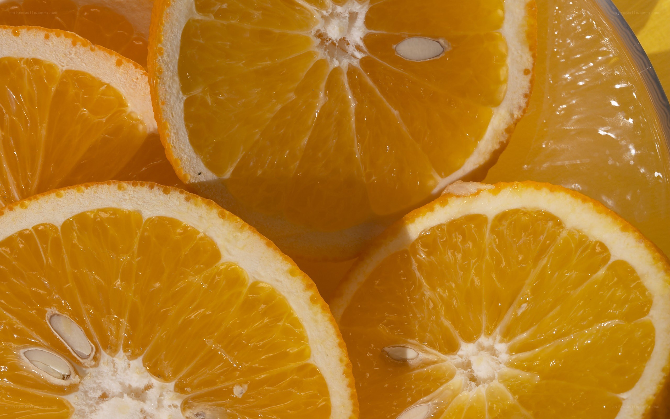 sliced oranges in a bowl