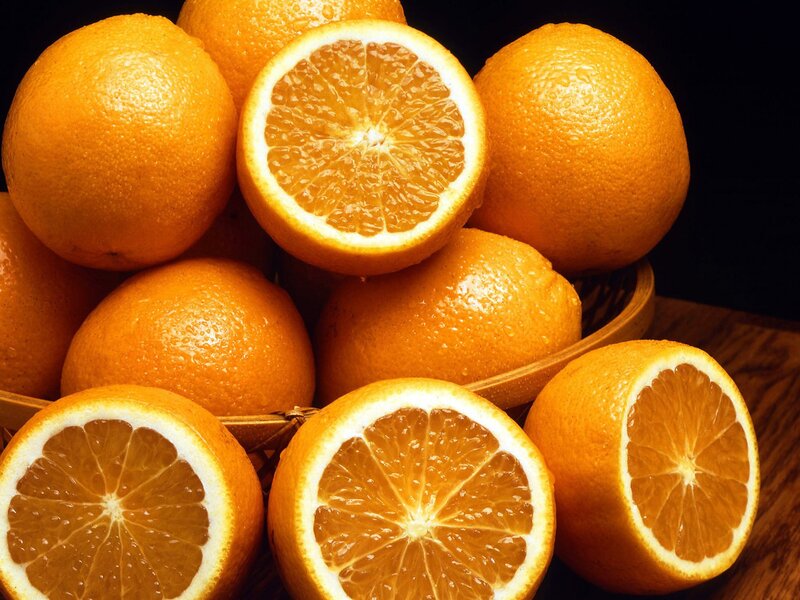 Sliced Oranges in Basket — Orange
