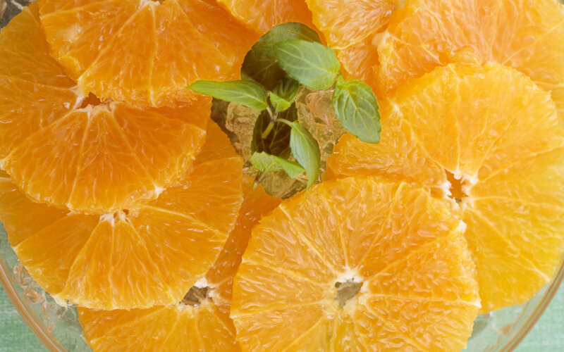 Sliced Oranges in Bowl — Orange