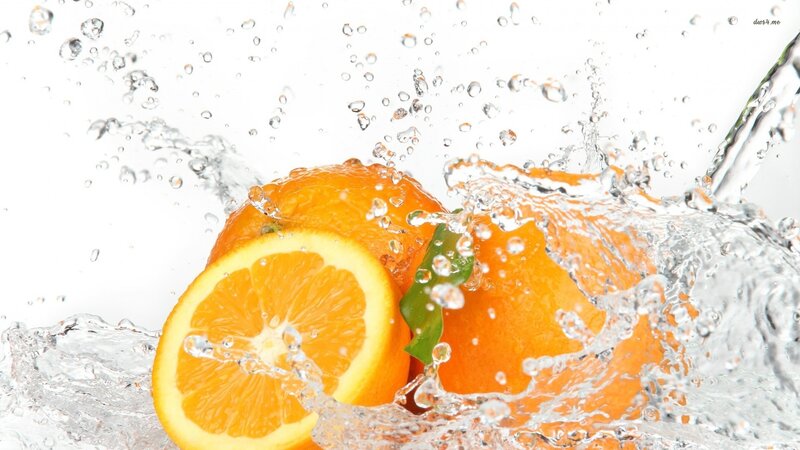 Sliced Oranges in Water — Orange